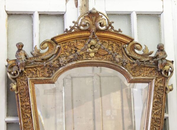 Rare French 19th Century Pair of Giltwood Cherub Mirrors