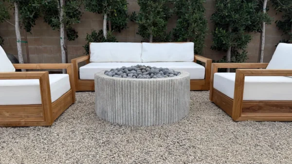 Custom Limestone Texture Fire Pit with Fluted Edges with Fire Pebbles